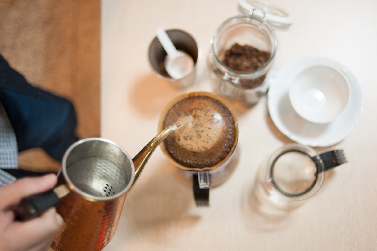 Fresh coffee being brewed by hand